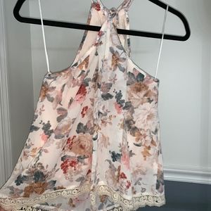 sleeveless floral top with lace trim